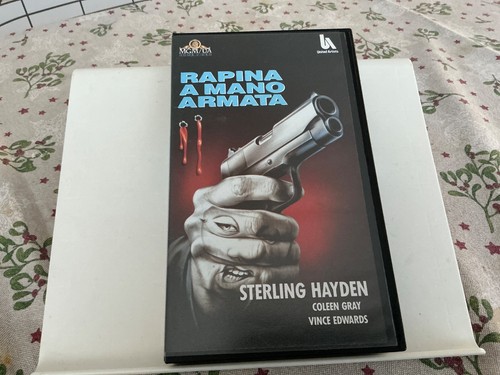 Rapina mano armata - a,
